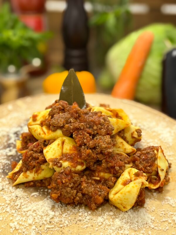 Agnolotti di carne con ragú (precio por ración)