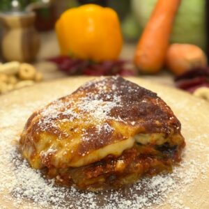 Parmigiana di melanzane (precio por ración)