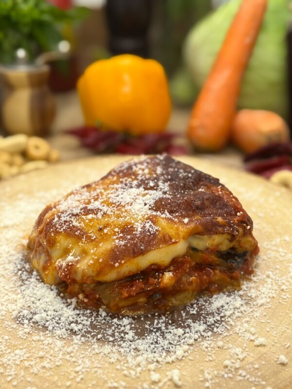 Parmigiana di melanzane (precio por ración)