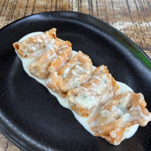 Tortelli alla mantovana con crema al gorgonzola (precio por ración)